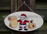 Türschild Weihnachtsmann mit Wunschzettel und großem Geschenkesack